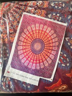 Indian bohemian-style peacock mandala wall hanging or bedding tapestry made of 100% cotton.