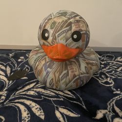 Solid rubber money duck