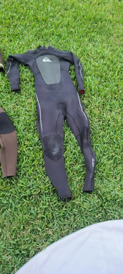 Boys Tall Wetsuit (Black) & Adult Medium Wetsuit (Brown)