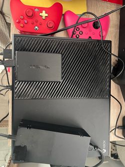 Xbox One Console with controllers and battery charger
