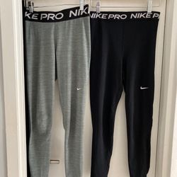 2 Pairs Nike Leggings (Sz.small-med.)