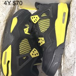 Black And Yellow Jordan 4s