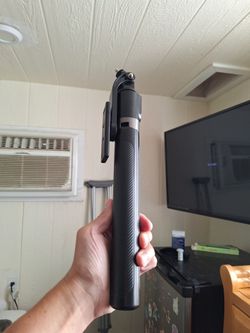Tripod selfie stick with Bluetooth remote shutter for phones