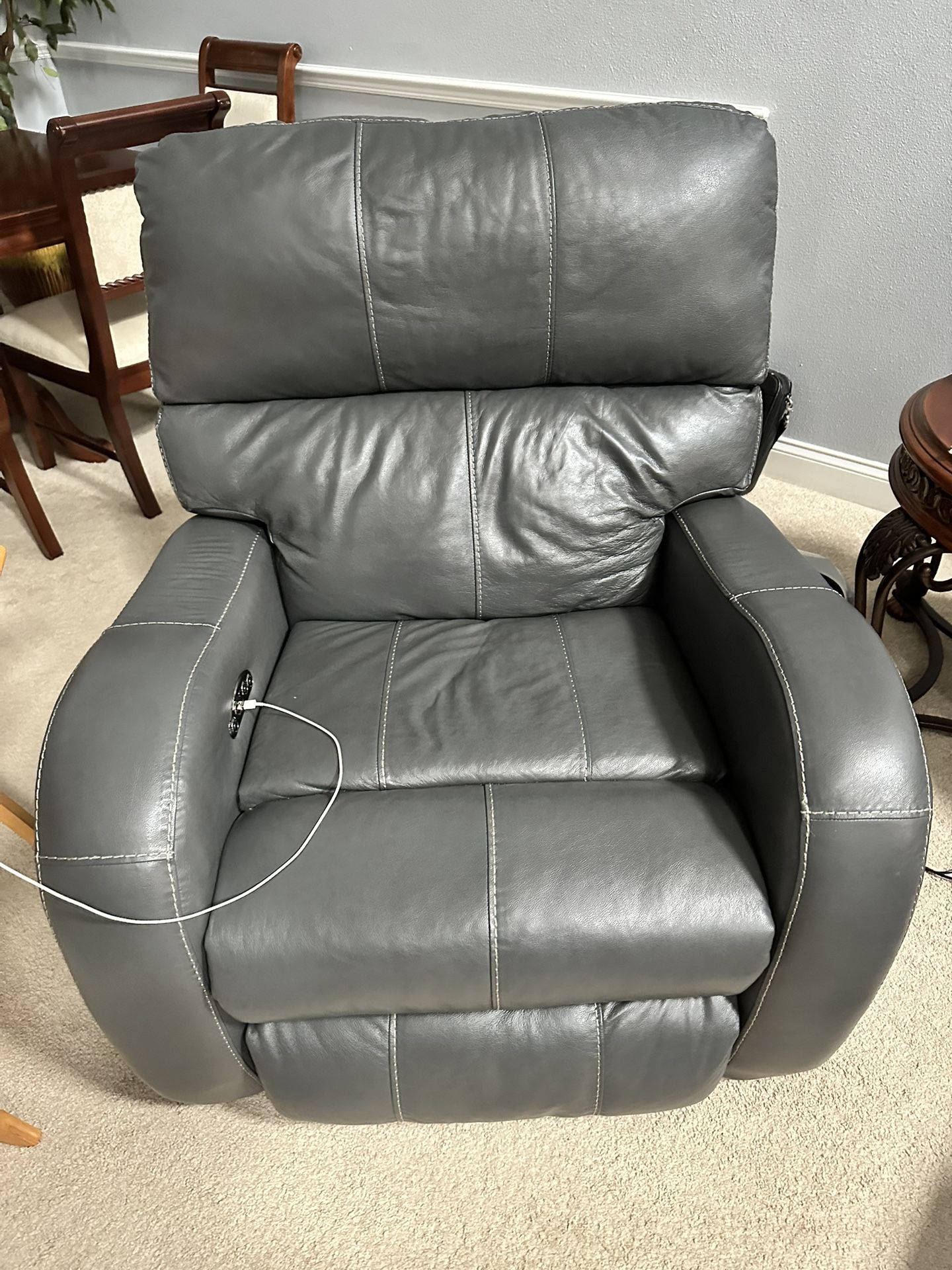 Like new grey Havarty electric recliner sofa .