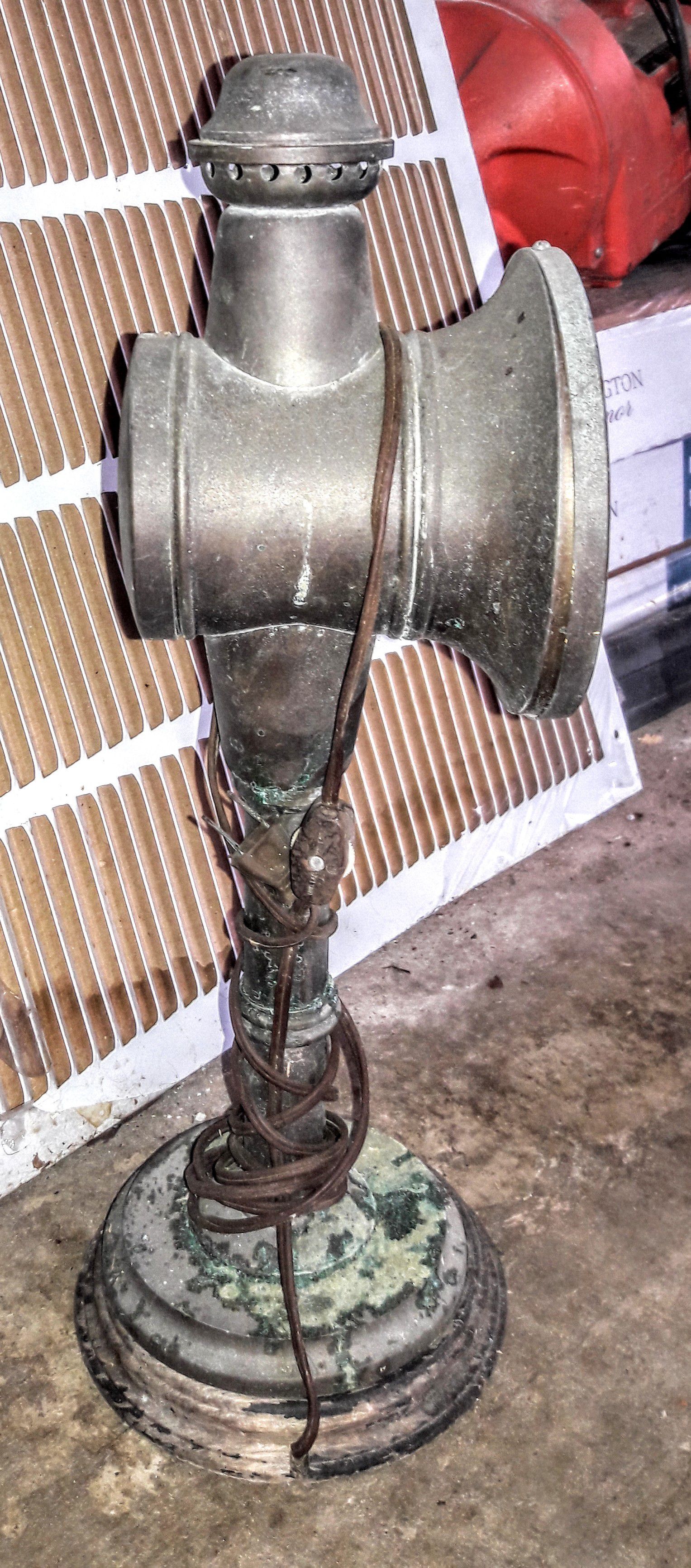 Antique rail lantern converted into electric lamp