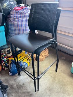 2 tall black chairs