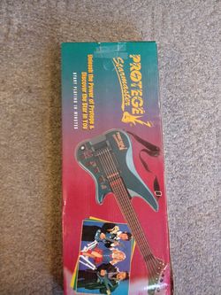 PROTEGE STARMASTER LEARING GUITAR BATTERY OPERATED WORKS GOOD IN GREAT SHAPE