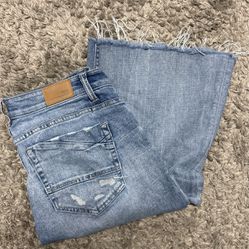 Buckle Mid Rise Flare Jeans 