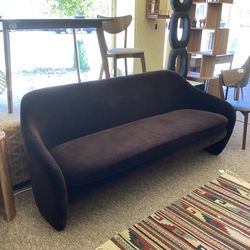 CB2 Dark Chocolate Curved Sofa