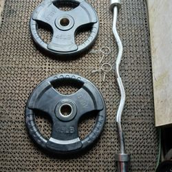 Olympic Weight plates with Olympic Crul Bar