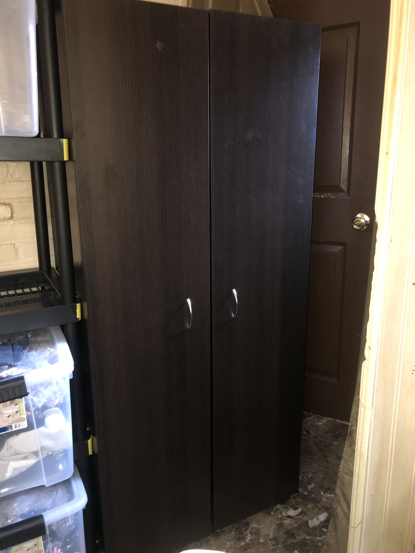 Dark brown wood wardrobe closet in good condition