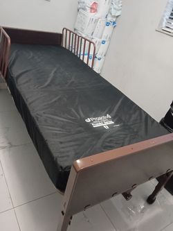 Hospital bed and mattress