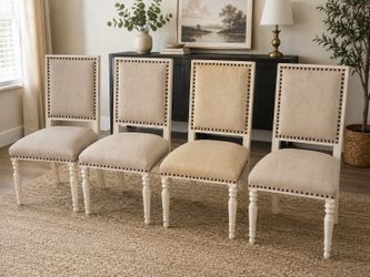 Set of 4 Cream Upholstered Dining Chairs w/ Nailhead Trim – $250