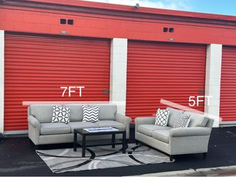 Crate and Barrel gray sofa and loveseat