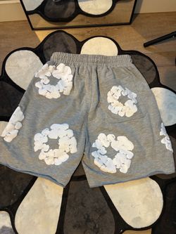 Denim tears grey white flower graphic