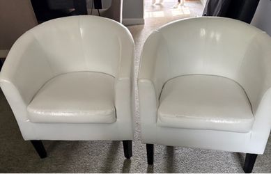 White bucket chairs.