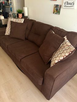 Brown Couch w/ 4 decor pillows