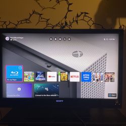 Flatscreen TV With Stand