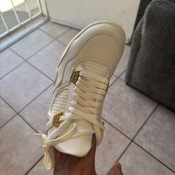 Jordan 4 Metallic Gold
