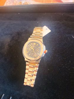 Brand new stainless steel gold colored watch for men