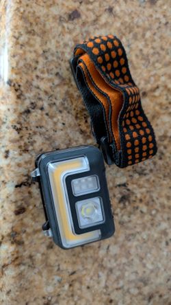 LED head lamp. Costco. Duracell. New. Never used.