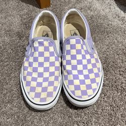 Purple slip on checkerboard vans 
