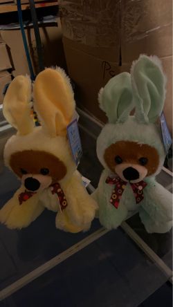 Easter sitting bear in bunny suit