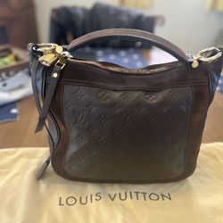 Louis Vuitton Leather/Suede Handbag 