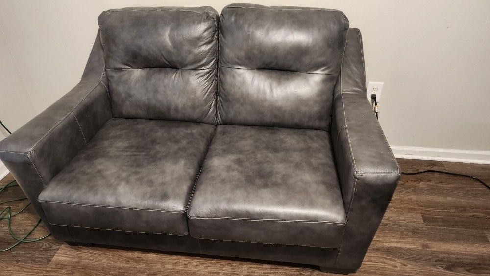 Leather Loveseat - $400