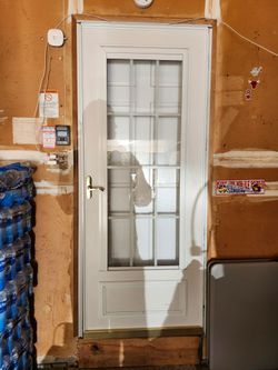 36" storm door with fold down screen window