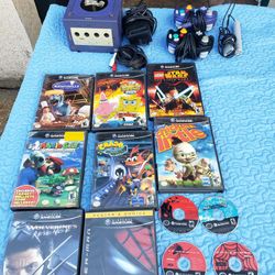$300! Firm Free Delivery In Person. 11 Great Games, 2 Controllers, 1 Mic, 1 GameCube Nintendo Purple or black. All work 100% nothing is missing come w
