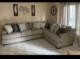 Beautiful Beige sectional couch from Jerome’s