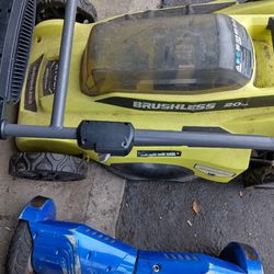 Ryobi Battery Powered Lawnmower And Weed Eater 