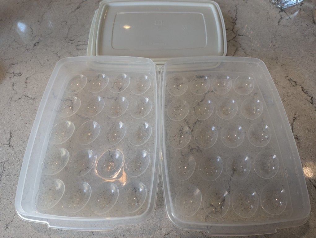 2 Egg storage containers each hold 24 eggs