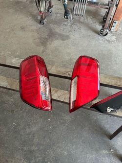 2016 Nissan frontier tail lights, cargo light.