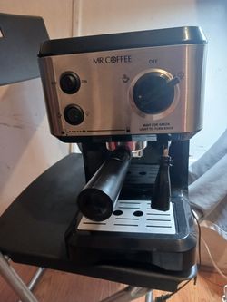 Mr. Coffee steam espresso maker,and frothing milk for cappuccinos or lattes.