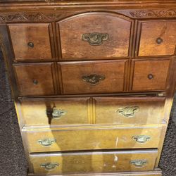 Dresser with Bird emblems on handles and vine engraving 