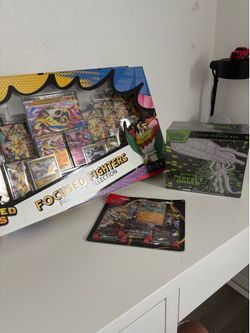 Ascended heroes focused fighter premium collection box, perfect order etb and pitch black 3 pack blister
