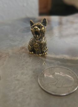 Yawning micro brass kitty