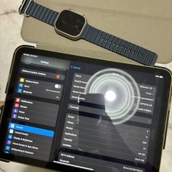 Apple Watch Ultra And iPad
