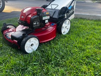 LAWN MOWER TORO  SELF PROPELLED  7.25 HORSEPOWER  163cc BIG REAR WHEELS  FRONT WHEEL DRIVE  In great condition ((like new)))