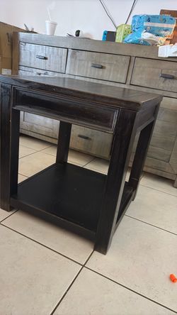 Dark wood end table