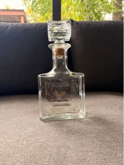 Decorative glass bottle with stopper