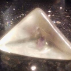 Pollucite Gemstone lightly etched. 10.60 cts.
