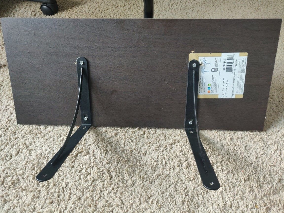 Lowe's Multiple purpose shelf with shelf brackets