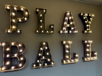 “play ball” marquee sign