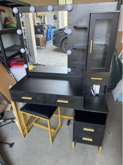 Vanity with lights and stool