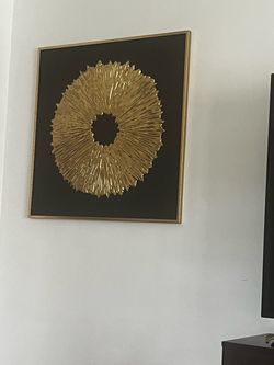 A pair of matching wall frames