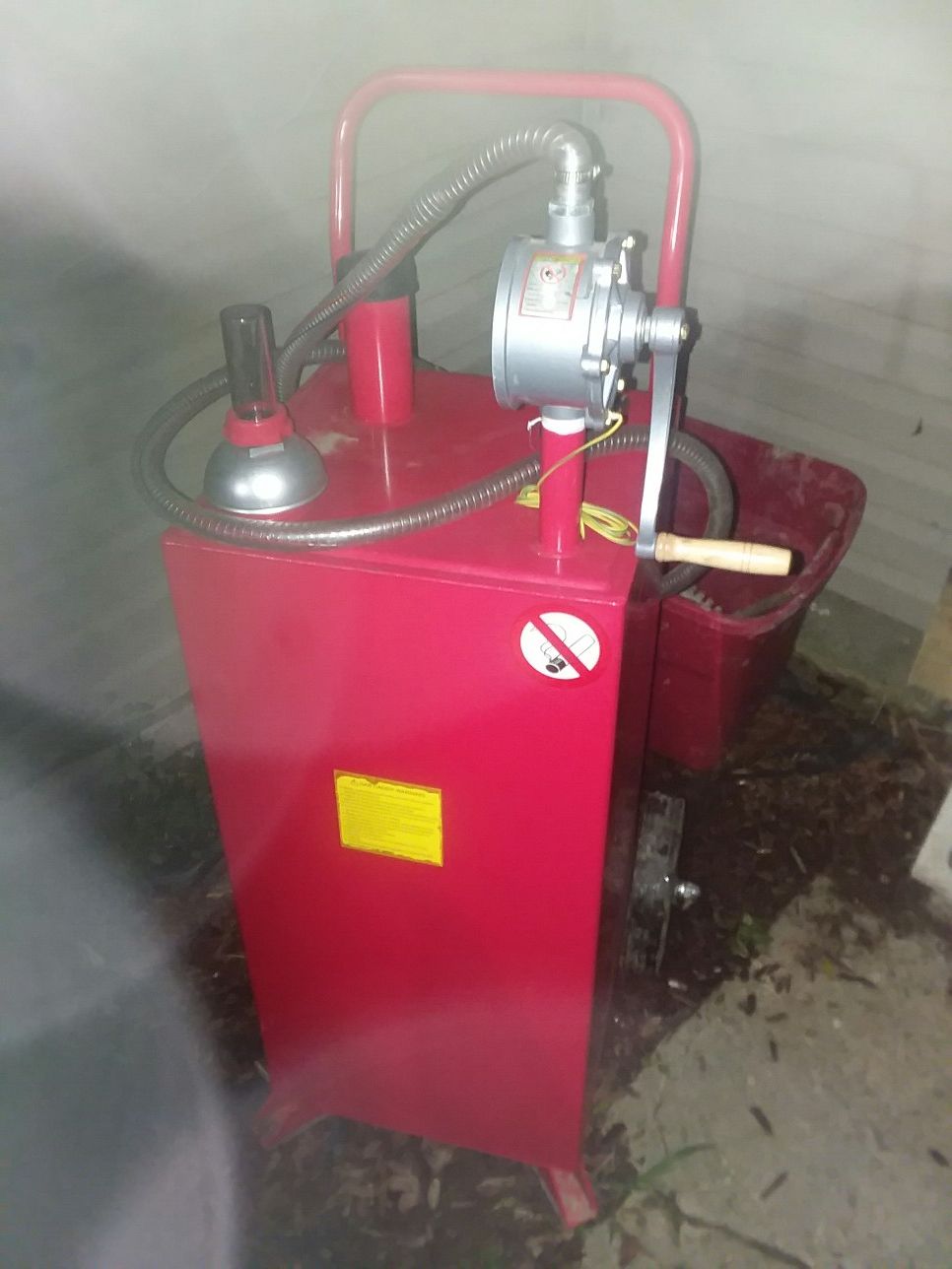 two 30 gal portable gas pumps