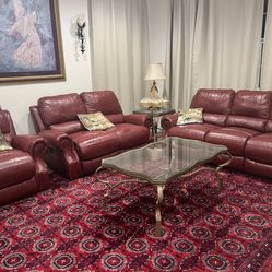 Red leather reclining sofa